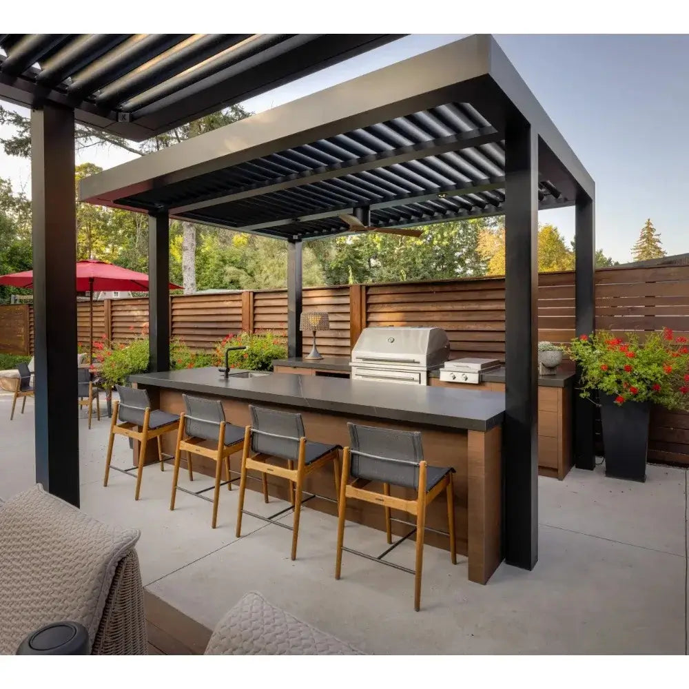 Stainless steel outdoor kitchen cabinet with seating in modern patio setting, perfect for outdoor grilling.