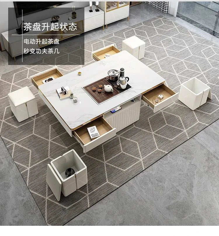 Modern living room with a multifunctional table and chairs on a geometric patterned rug.
