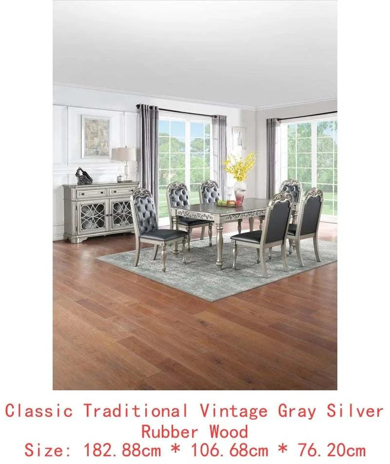 Dining room set with table and chairs in a well-lit room.