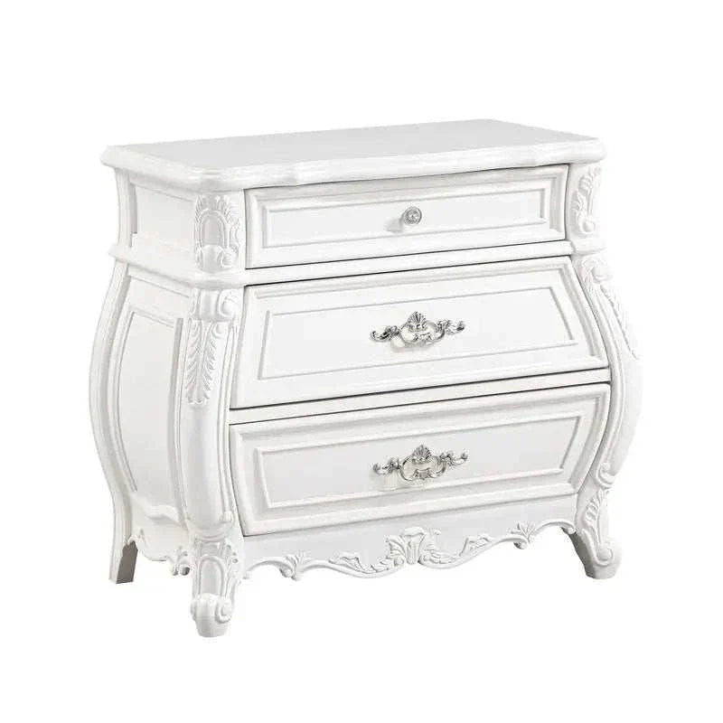 White ornate chest of drawers on a white background