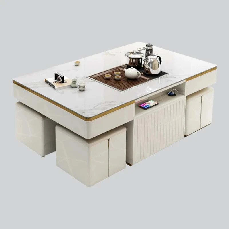 Modern coffee table with tea set on a light gray background