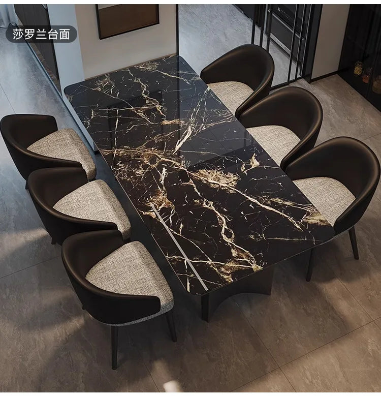 Italian Marble Dining Set featuring a luxurious black marble rectangular table and stylish chairs.