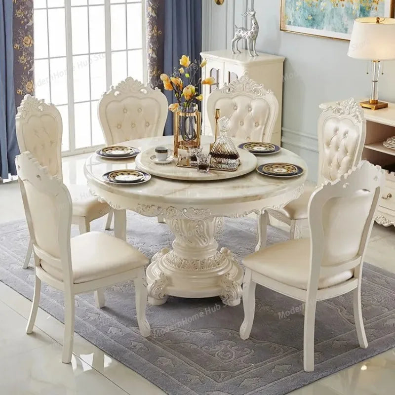 european marble round dining table with solid wood base and elegant white chairs in stylish dining room