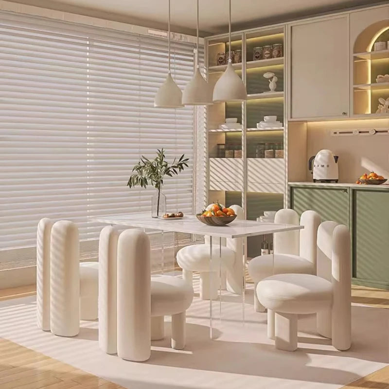 Art-Style Rock Slab Dining Table Set in a modern kitchen with white chairs and elegant decor.