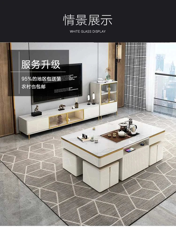 Modern living room with a TV stand, coffee table, and decorative items.