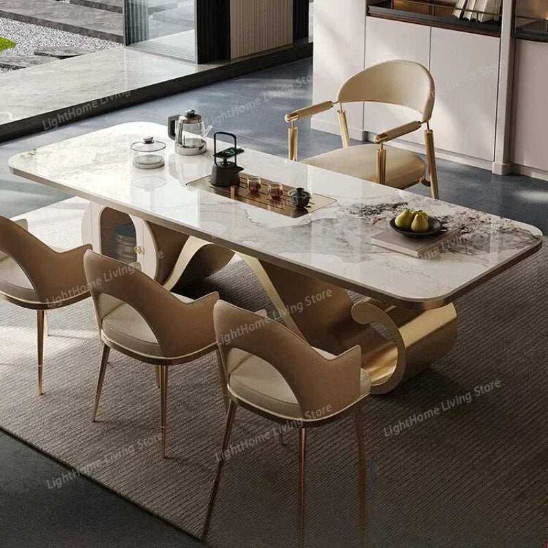 Dining table set with marble surface and modern chairs in a room setting.