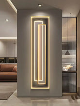 Modern LED mural light for modern decor illuminating a sleek vertical design on a stylish wall.