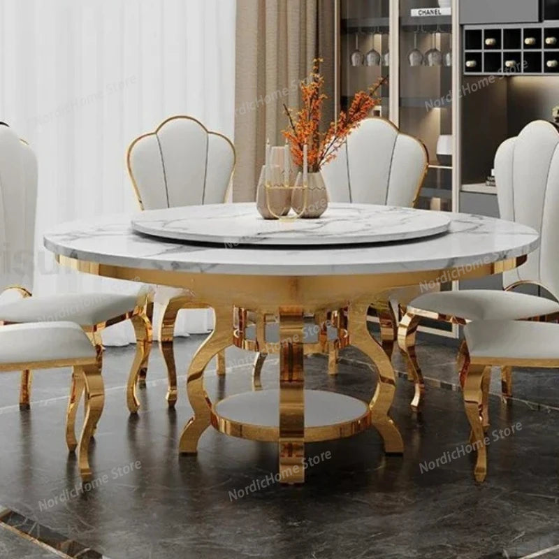 Modern marble glass dining table set with elegant gold frame and white chairs in a luxurious dining room.