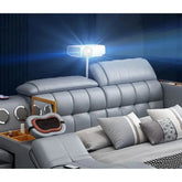 Smart leather bed with massage and storage featuring integrated projector and Bluetooth audio.