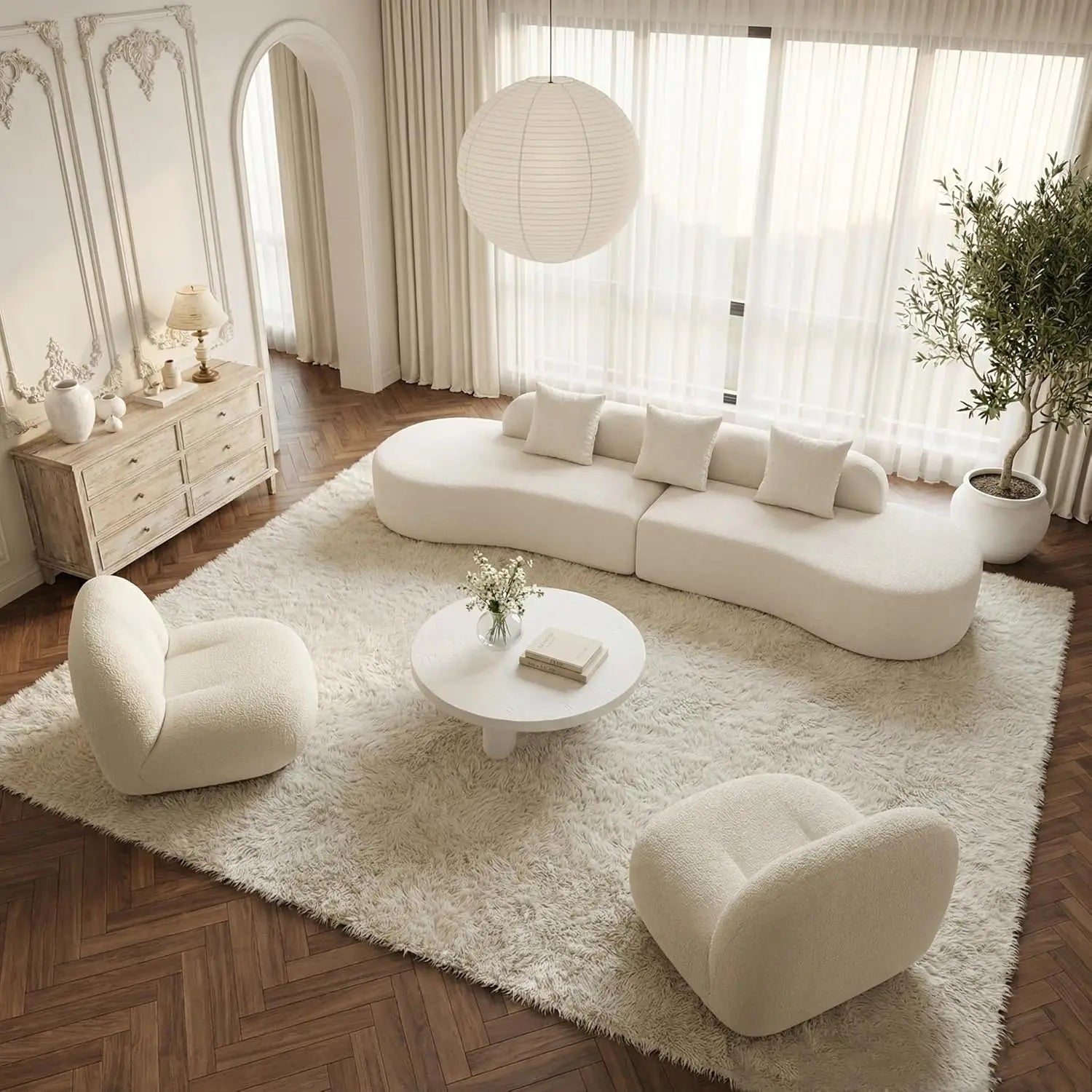 Modern living room with white furniture and decor