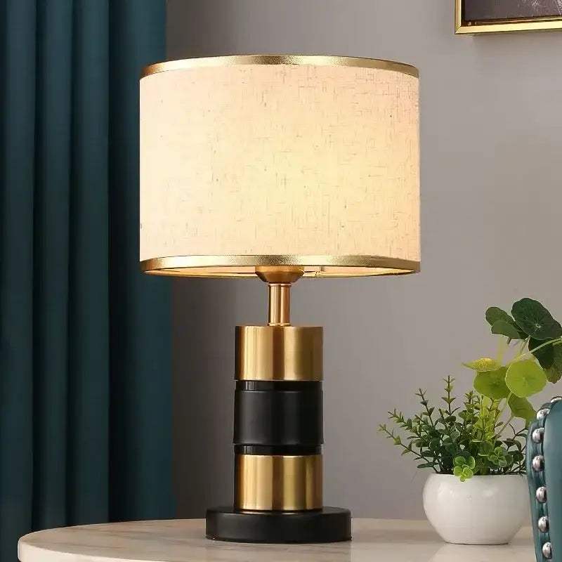 Luxury LED bedside lamp with gold frame and fabric shade, ideal for modern bedroom decor.