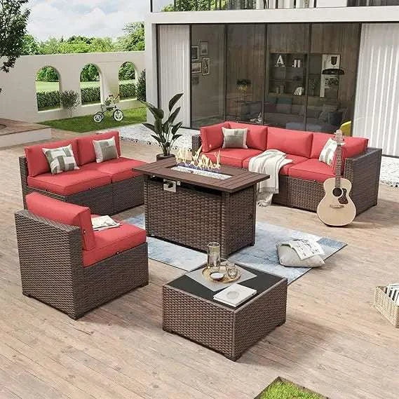 Outdoor patio set with red cushions and a fire pit table on a wooden deck.