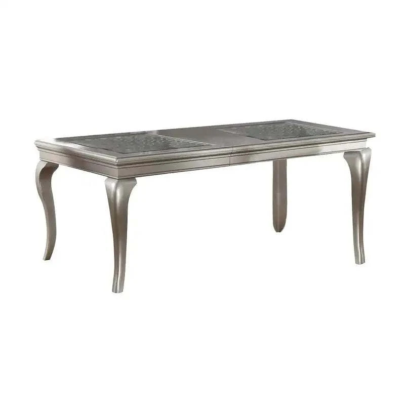 Silver dining table with marble top on a white background