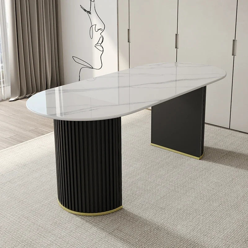 Modern dining table with black cylindrical base in a room setting