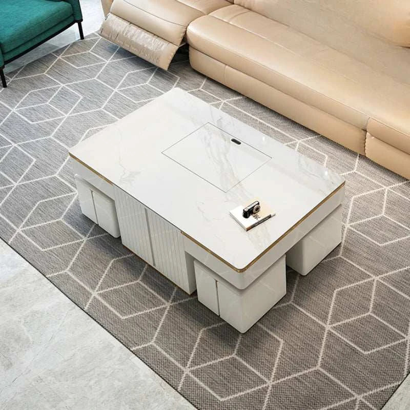Modern living room with a marble coffee table on a geometric patterned rug.