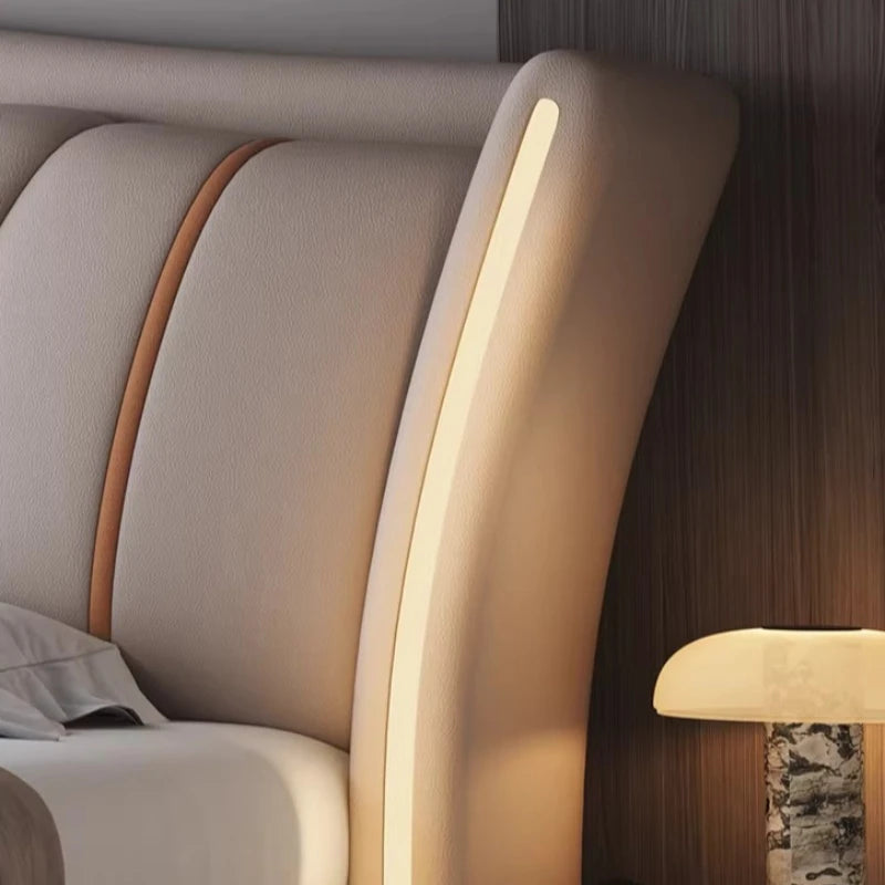 luxury leather bed frame with elegant headboard design, showcasing modern minimalism and integrated lighting accents.