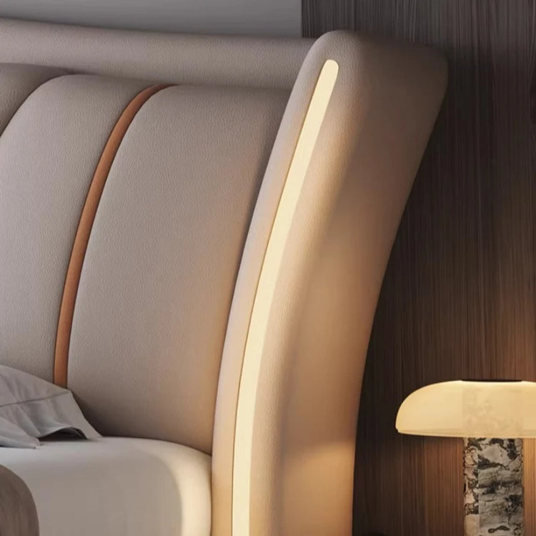 Close-up of a modern headboard with LED strip lighting.