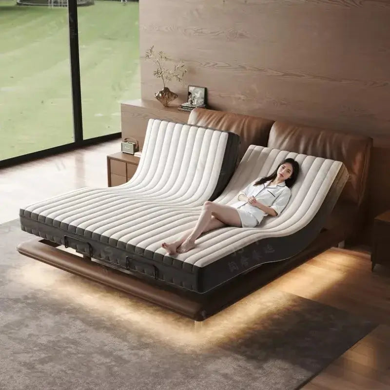 Luxury adjustable smart bed with customizable base and a woman relaxing in a modern bedroom.