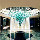 Luxurious chandelier with teal accents in a modern interior setting