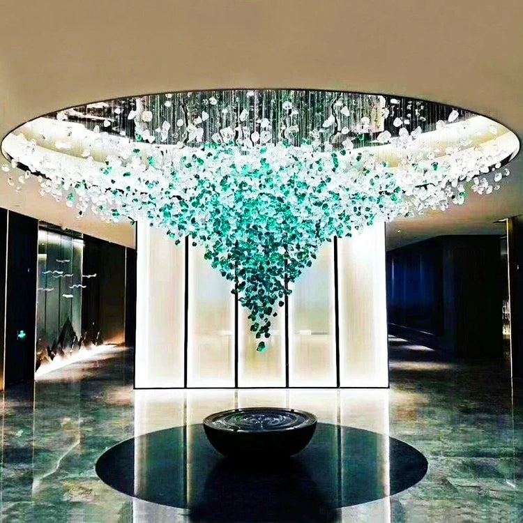 Luxurious chandelier with teal accents in a modern interior setting