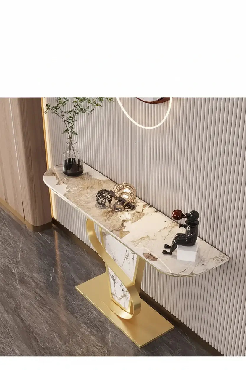 Decorative console table with marble top and gold base in a room setting.