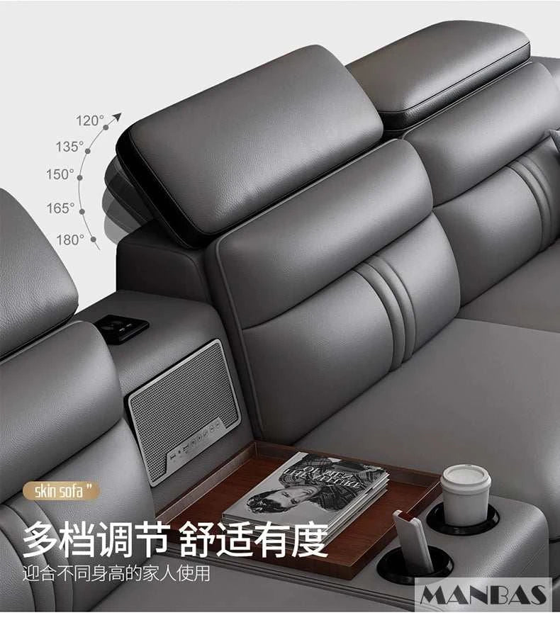 Gray sofa with adjustable headrests and a cup holder, featuring MANBAS branding.