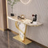 Decorative console table with marble top and gold base against a striped wall.