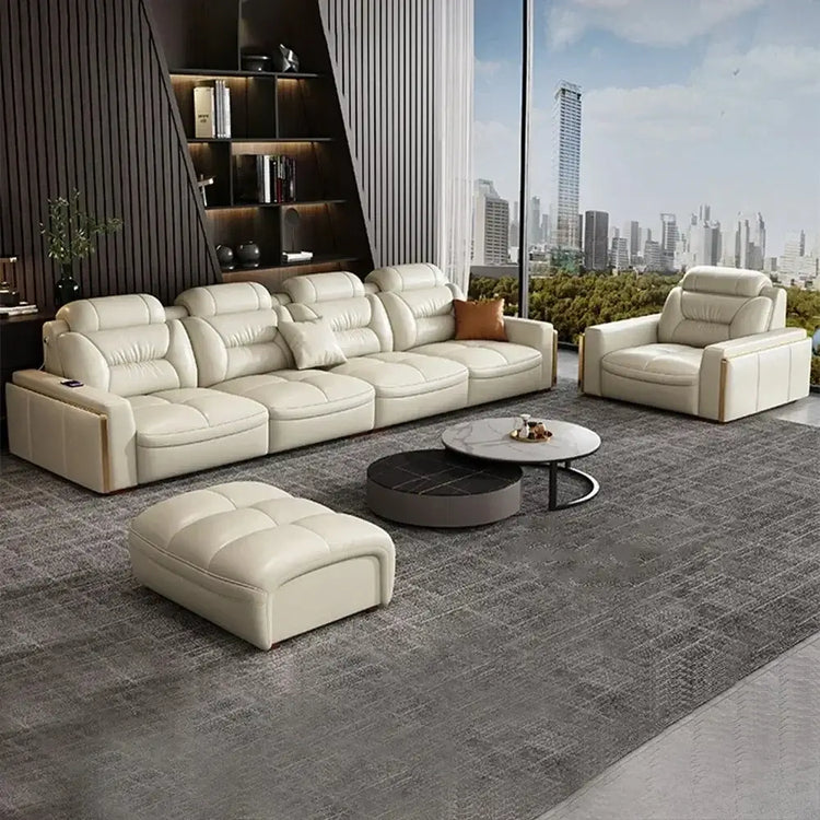 Premium Italian leather sectional sofa with USB and Bluetooth in a modern living room setup.
