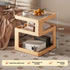 Wooden side table with storage compartments, placed next to a sofa in a living room setting.