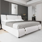 Modern faux leather upholstered bed with adjustable curved headboard and metal decor in a contemporary bedroom setting