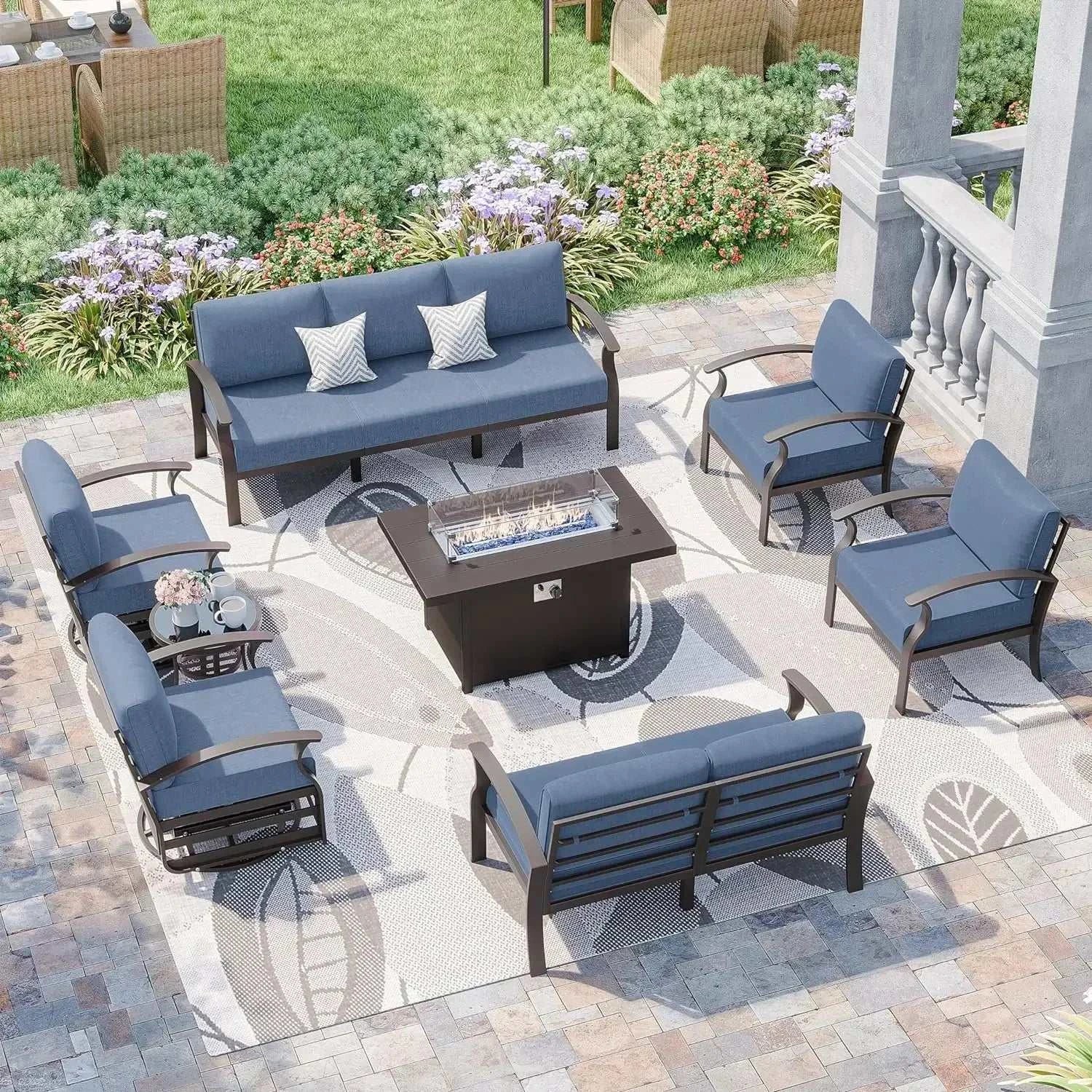 Aluminum patio furniture set with blue cushions and 55,000 BTU propane fire pit on outdoor patio