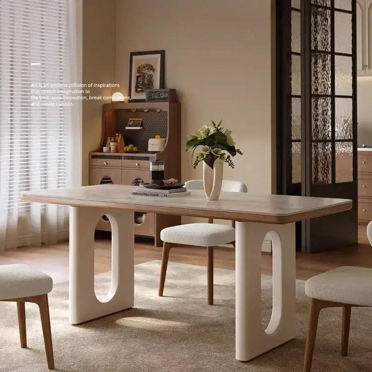 6 person white dining table in modern Nordic living room design with stylish wooden finish and unique base.