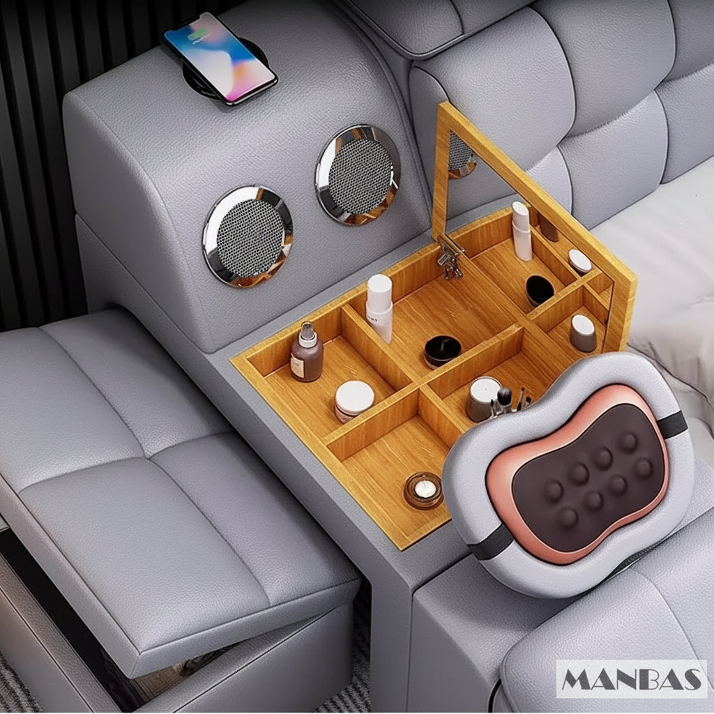 Gray car interior with a wooden tray, wireless charging pad, and massage pillow, featuring MANEAS branding.