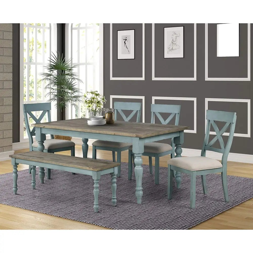 Dining room set with wooden table and chairs in a room with gray walls and a rug.