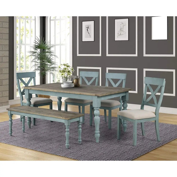 Dining room set with wooden table and chairs in a room with gray walls and a rug.