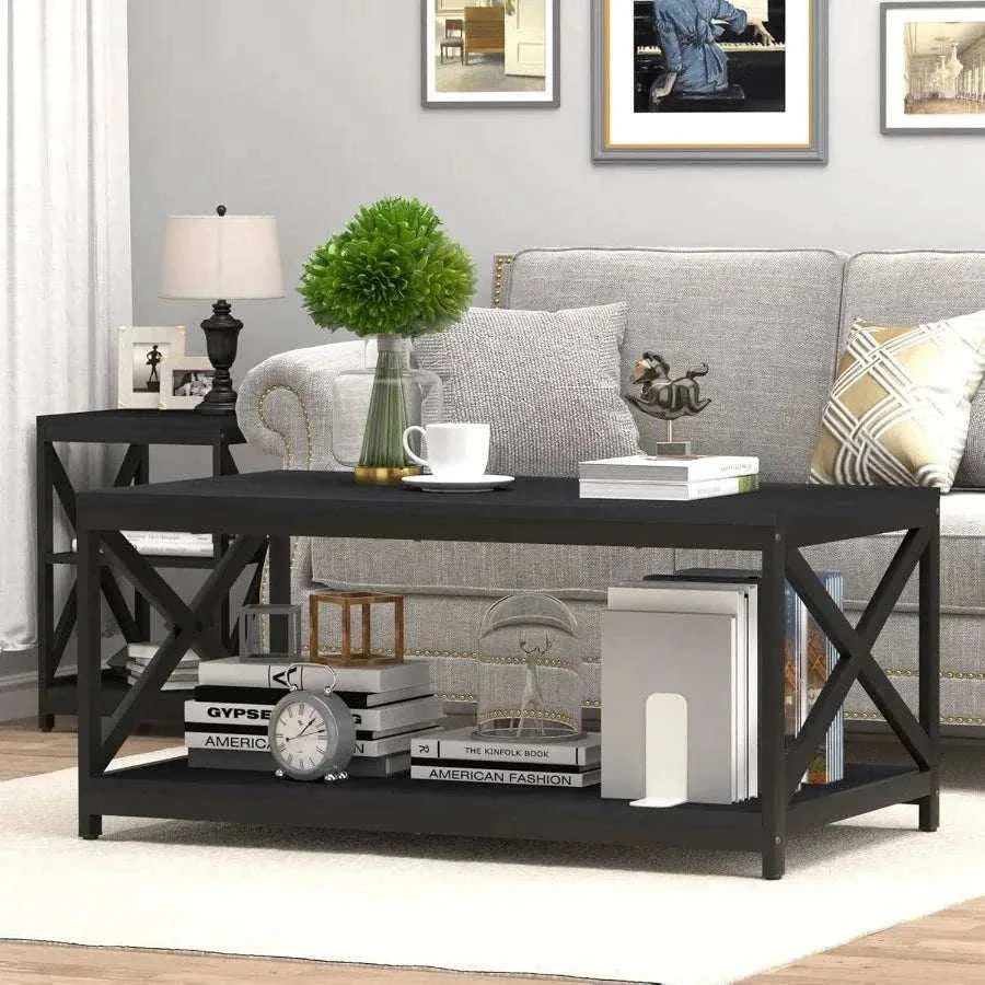 Black coffee table with decorative items in a living room setting