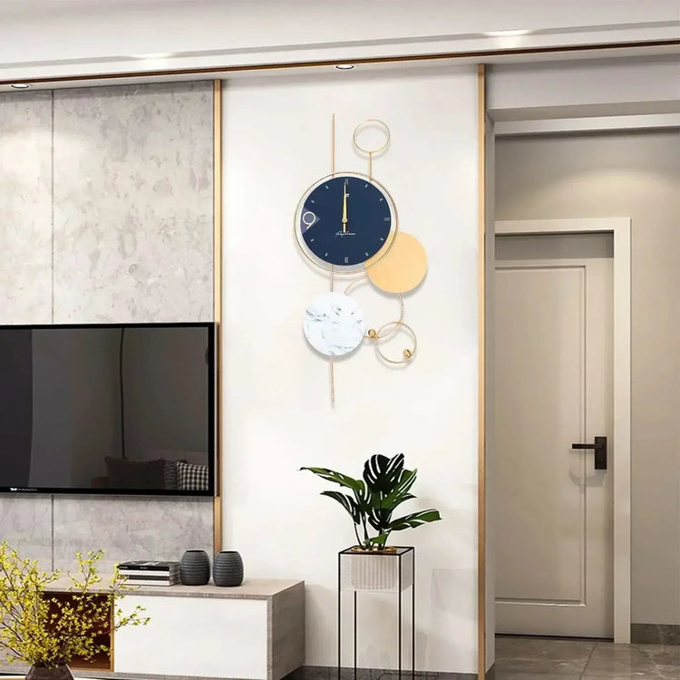 Stylish large gold metal wall clock enhancing modern living room decor with elegant design and high-quality materials.