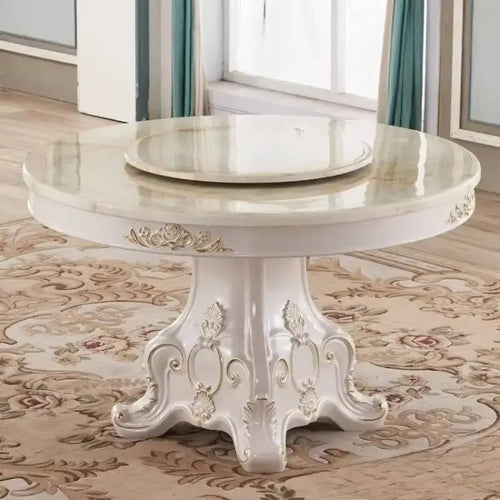 4 person gold dining table in modern design, round shape with elegant details for living room decor.