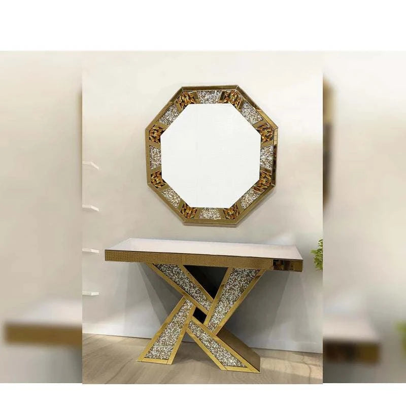 Decorative console table with an octagonal mirror on a plain background
