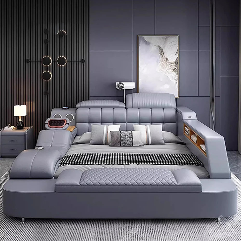 Modern bedroom with a large gray bed and decorative pillows.