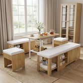 Wooden dining set with benches and a table in a room with large windows and curtains.