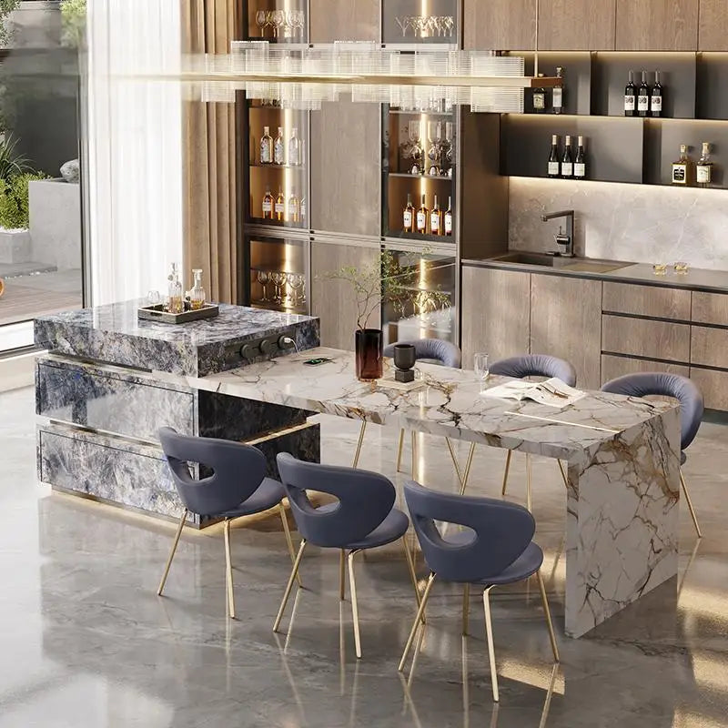 Modern kitchen with marble island and dining table
