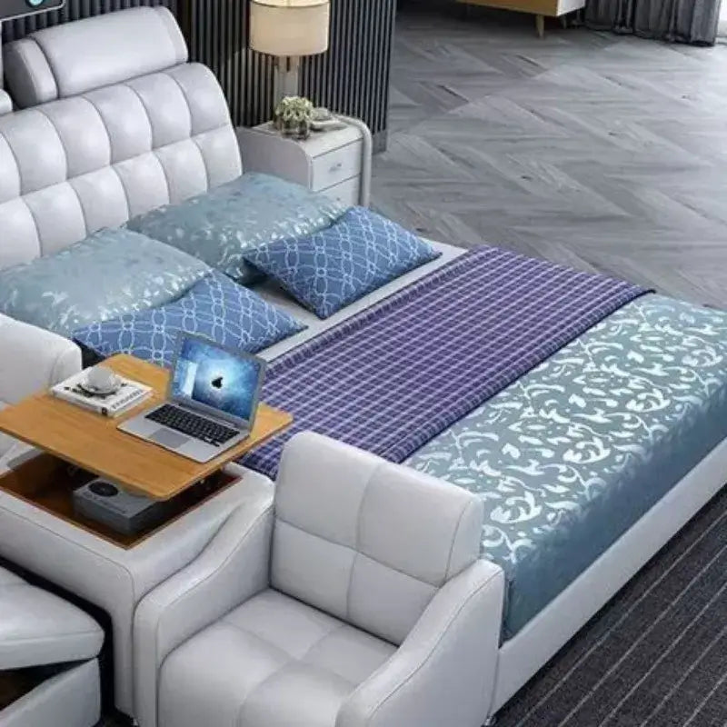 Luxury smart leather king size bed with elegant bedding and a side table featuring a laptop.