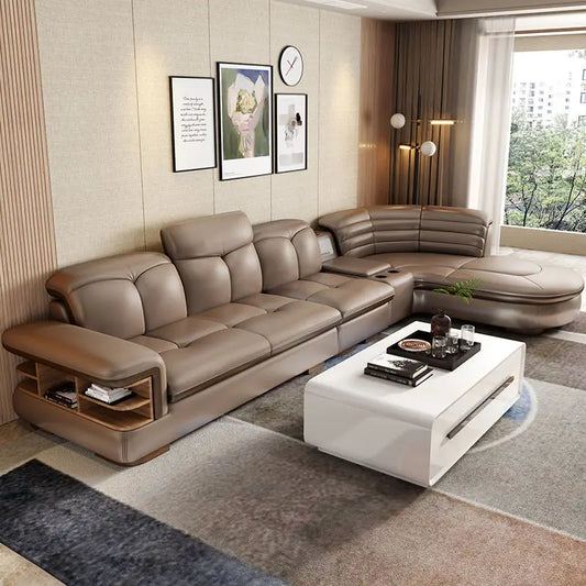 Modern living room with a beige sectional sofa and white coffee table.