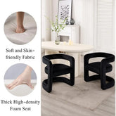 Two black chairs in a room with text about soft fabric and thick foam seat.