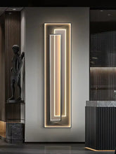 LED mural light for modern decor illuminating a sleek vertical design on a wall.