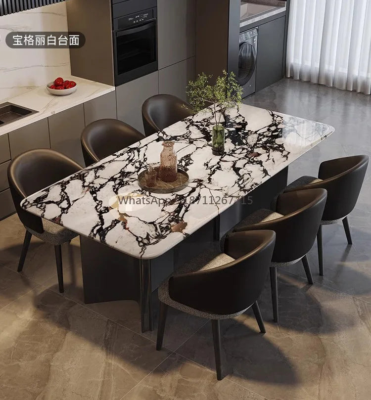 Italian Marble Dining Set featuring a luxurious rectangular table with black and white marble and elegant chairs in a modern dining space.