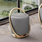 Nordic modern dressing table set stool with elegant gold details in a contemporary living space.