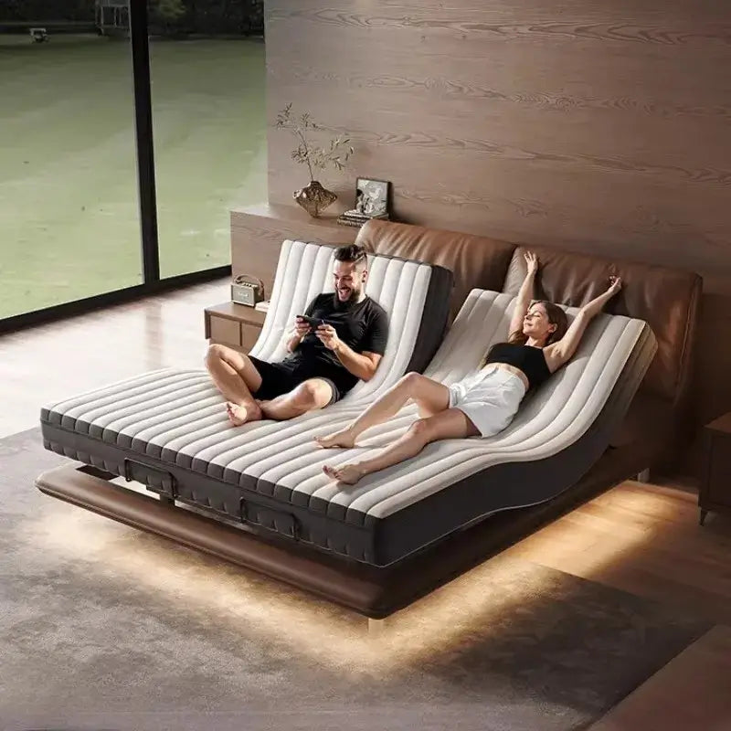 Luxury adjustable smart bed featuring two individuals relaxing on an adjustable base in a modern bedroom.
