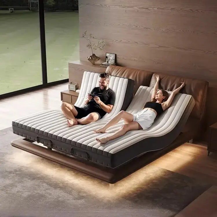 Luxury adjustable smart bed featuring two individuals relaxing on an adjustable base in a modern bedroom.